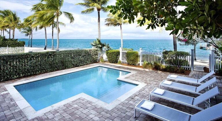 Sunset Key Cottage pool and view of ocean