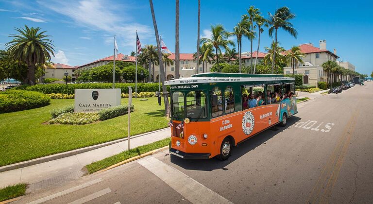 Key West Old Town Trolley driving past Casa Marina